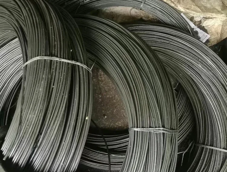Coils of carbon steel wire bundled for handling