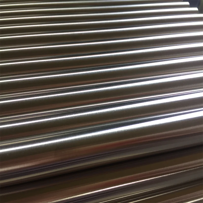 Polished stainless steel round bars arranged in parallel